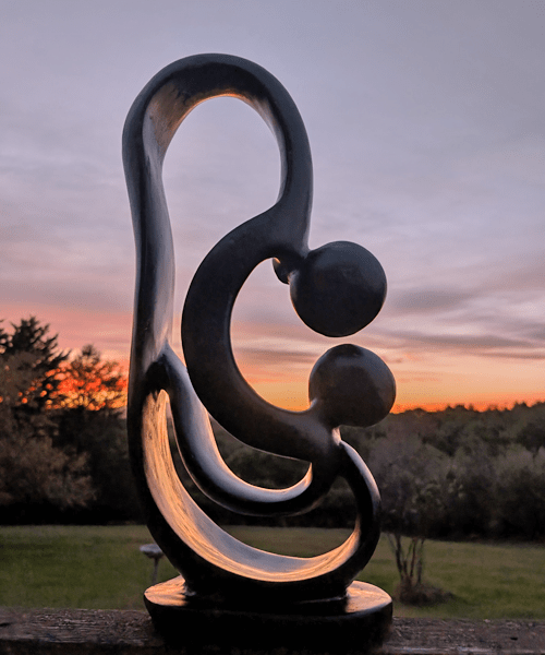 attachment therapy represented by abstract concrete sculpture of two figures in Shenandoah Valley